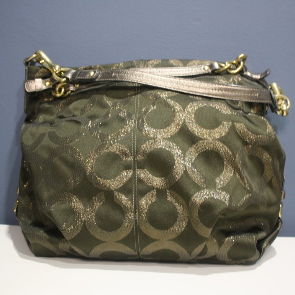 Coach brown monogrammed handbag with gold accents